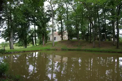 Image de Location d'une maison neuve classee *** dans parc avec étang