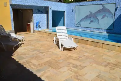 Image de Maison dans cond. avec plage privée, 4 qtos, piscine, barbecue, sauna + cour.