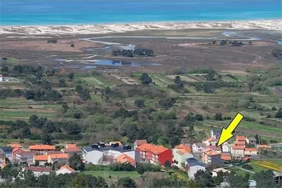 Image de Grande maison avec jardin dans Carnota
