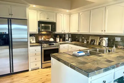 Image de Une maison avec tous les avantages d'un hôtel! Parfait pour votre séjour à So Cal