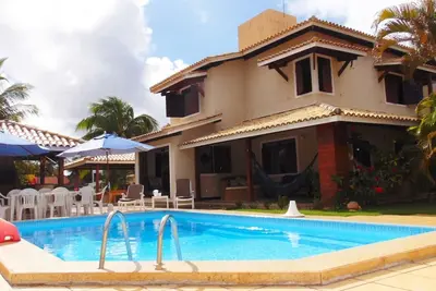 Image de Casa Gostosa 4 chambres à 300m de la plage avec table de billard et piscine