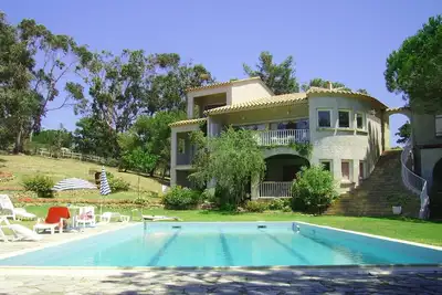 Image de Appart 4/5 Pers. 50 m²  avec 2 chambres, Piscine, Jardin et Vue golfe Ajaccio