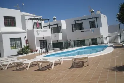 Image de Appartement au 1er étage avec balcon et piscine