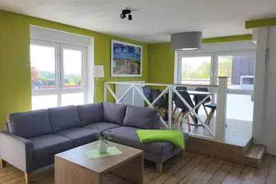 Image de Residence Naturdüne Appartement 11, non fumeur, balcon, vue sur le lac, piscine et sauna