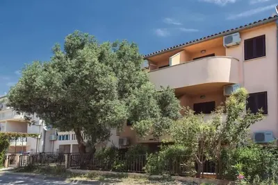 Image de A seulement 100 mètres de la plage avec air conditionné et WiFi