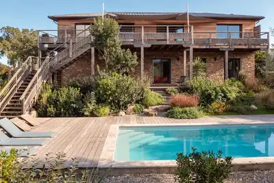 Image de Villa Casasou, Pinarello, piscine chauffée, plage 800 m, vue montagne, clim