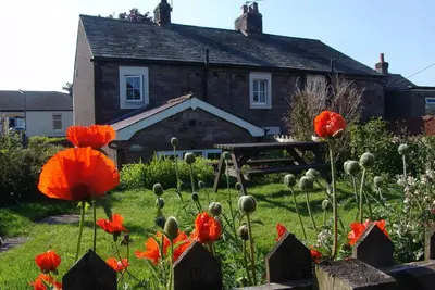 Image de Poppy Cottage, Cosy 19ème Centry chalet traditionnel, à 5 miles de Bassenthwaite