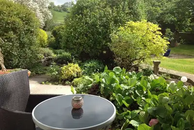 Image de Charmant Cottage dans un endroit rural paisible, mais à seulement 5 minutes de la ville.