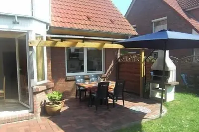 Image de Appartement de vacances Carolinensiel pour 1 - 4 personnes avec 2 chambres à coucher - Appartement d