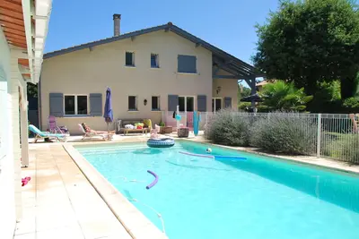 Image de Grande Villa moderne 200m2 12 pers piscine entre Bordeaux, Océan et le Médoc