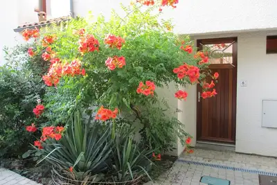 Image de Jolie maison de vacances** proche plages et commerces dans quartier résidentiel