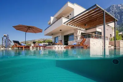 Image de ctma105 -Maison de vacances moderne avec une belle terrasse et piscine à débordement (33 m2)