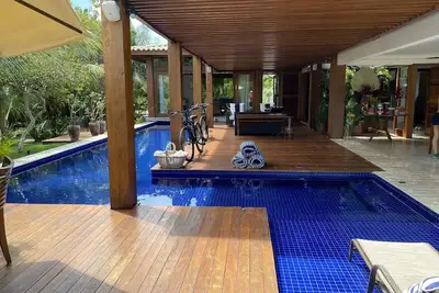 Image de Maison à Praia do Forte, 5 suites w / air, à 100 mètres de la piscine de plage