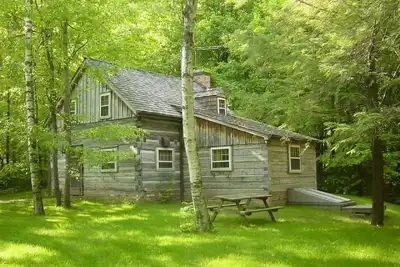 Image de Log Cabin sur 280 acres privés. Natation, Vtt, randonnée, ski de fond