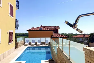 Image de Appartement 4 dans la villa Ă Savudrija, avec jardin piscine barbecue parking