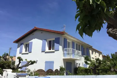 Image de Superbe appartement dans villa vue dégagée plein sud à 200 mètres de la plage!