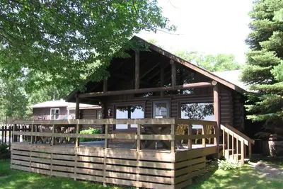 Image de Adventure North - Log Reunion Home avec une vue imprenable pour 15 Ă 20 personnes