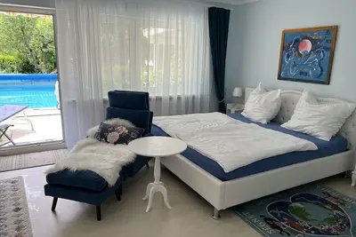 Image de Appartement de deux pièces avec piscine dans la zone de loisirs locale Waldkirch Suggental