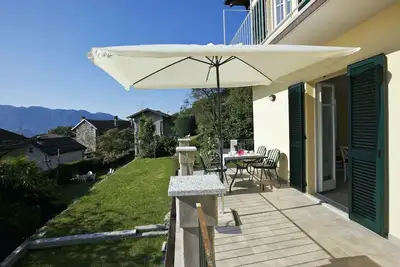 Image de Appartement de 3½ pièces bien entretenu avec jardin, balcon et belle vue sur le lac