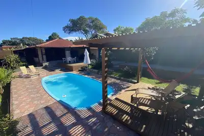 Image de Maison avec piscine et grand espace de loisirs sur la plage de rosa.