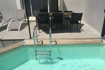 Image de Maison récente T4 De 89 M2 avec piscine idéalement situé en vaunage.