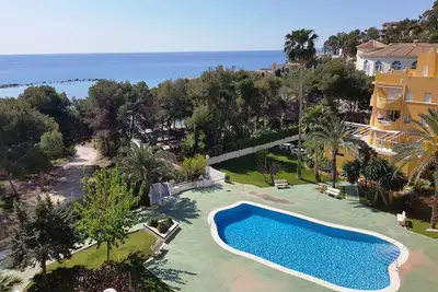 Image de Appartement 1ère Ligne de mer, piscine, Air-co.