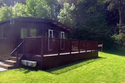 Image de Magnifique chalet de vacances en front de rivière.