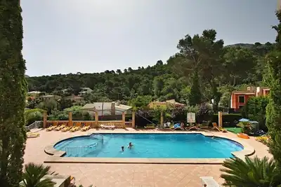Image de Appartement de vacances dans un petit complexe avec piscine communautaire, Wifi gratuit