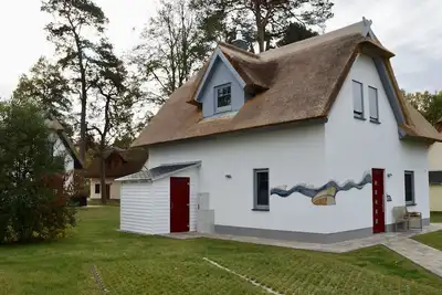 Soleil, vent et \"son de la vague\" dans la maison de vacances avec cheminée et sauna