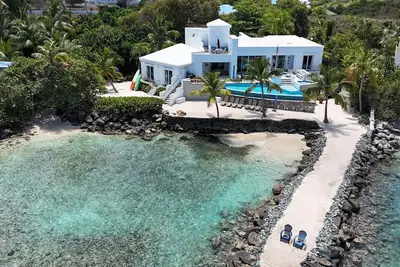 Une Route De La Plage; 5 chambres, 5 1/2 salles de bain Oasis St Thomas Vi en bord de mer
