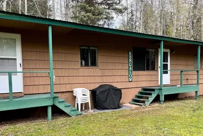 Image de Retraite familiale dans un magnifique cadre boisé avec accès au lac