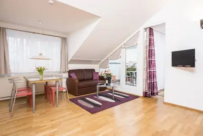 Image de Appartement avec terrasse sur le toit avec vue sur la cour et sa propre terrasse