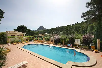 Image de Apt. Grande Ciruelo, A\/C, piscine communautaire, Wifi, près de la plage 400 m