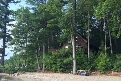 Image de Cabine longue lac avec plage de sable