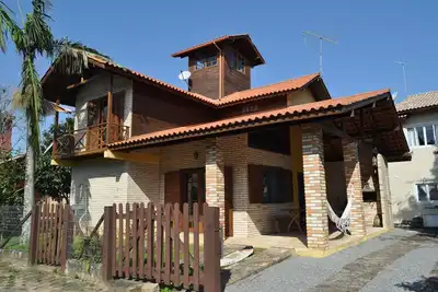 Image de Beach house avec salle de bains, air conditionné, ciel, barbecue et très bien situé