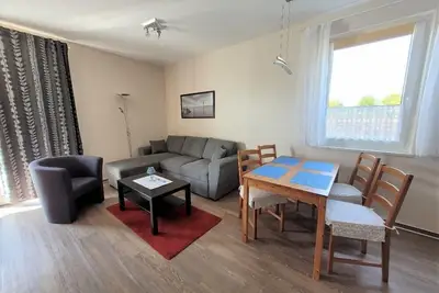 Image de House Leuchtfeuer Appartement 7, non fumeur, terrasse au sud avec chaise de plage