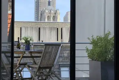 Image de Loft avec terrasse au Top! Dans le centre-ville avec une superbe vue sur la cathédrale!