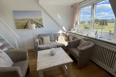 Image de Appartement soigné et lumineux avec vue sur les champs de Morsum dans un endroit calme