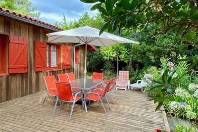 Image de Maison en bois confortable et joliment décorée au Cap Ferret, à 300m de la plage