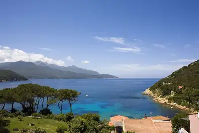 Image de Superbe vue pour les appartements avec véranda et jardin, à quelques pas de la plage de Forno
