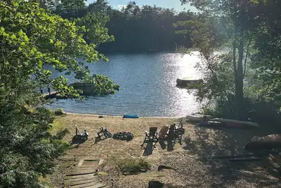 Image de Lac Winnipesaukee front de mer avec plage privée, un quai à Moultonborough