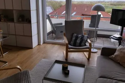 Image de Vacation apartment on Borkum with sunny balcony and view of the Ostland.