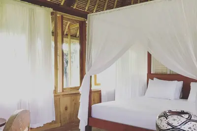 Image de Manusia Dunia Green Lodge ¬ Maison en bois