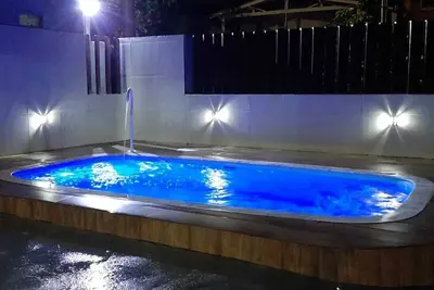 Image de Maison à Caraguatatuba à 30 mètres de Praia Tabatinga avec climatisation