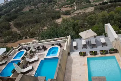 Image de Chambre Deluxe avec vue sur la vallée et la piscine
