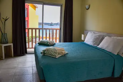 Image de Luxueux 2 chambres W jardin partiel et vue sur l'océan