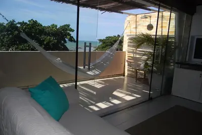 Image de CocoBeachNat 5a. 120mq en mer. 2 suites. Pieds dans le sable. des vacances inoubliables!