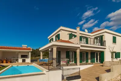 Image de Villa Eni avec piscine extérieure