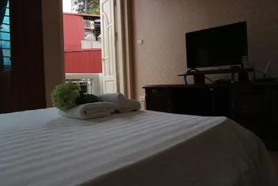 Image de Chambre double confortable avec balcon privé