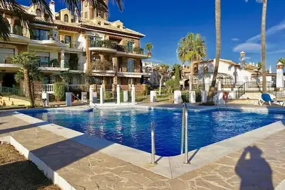 Image de Penthouse de luxe de deux chambres - exposition sud, Wifi, climatisation, piscine et vue sur le golf